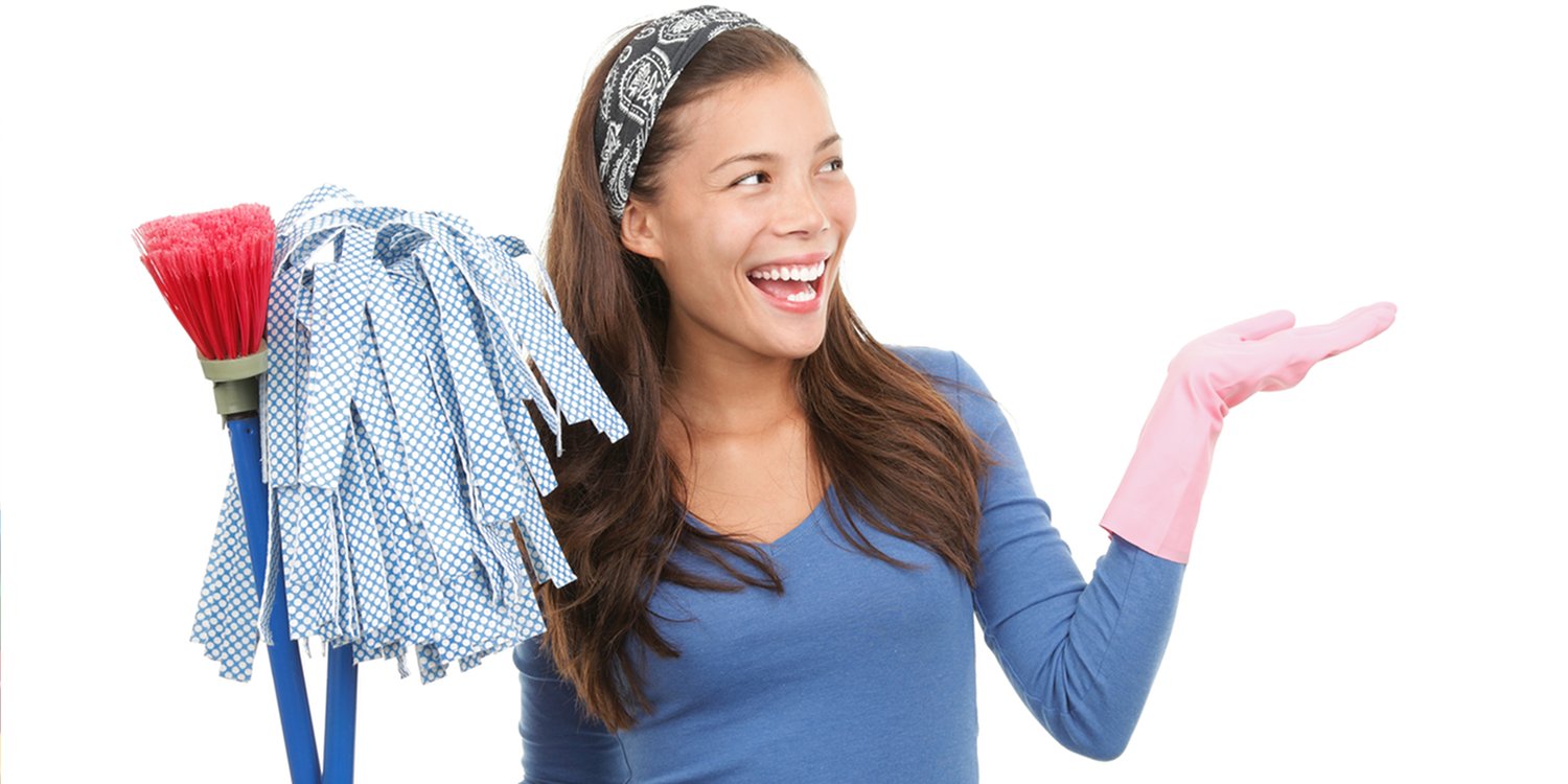 Woman holding cleaning products