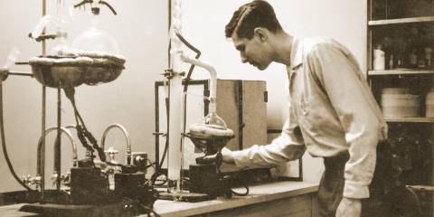 An old photo of Elwood Richard working in his lab