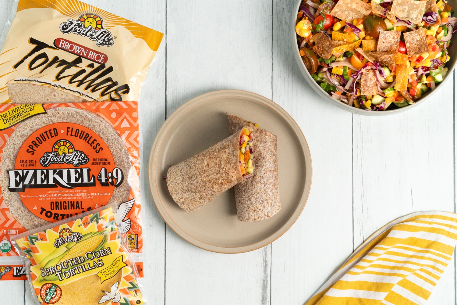 veggie wrap on plate tortilla packages on the table