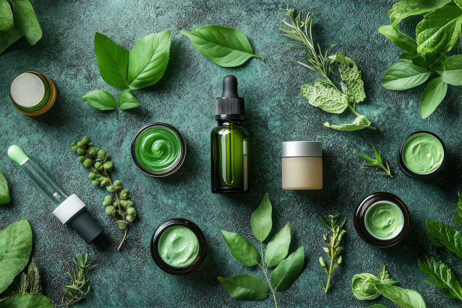 bakuchiol skin-care products surrounded by fresh greenery