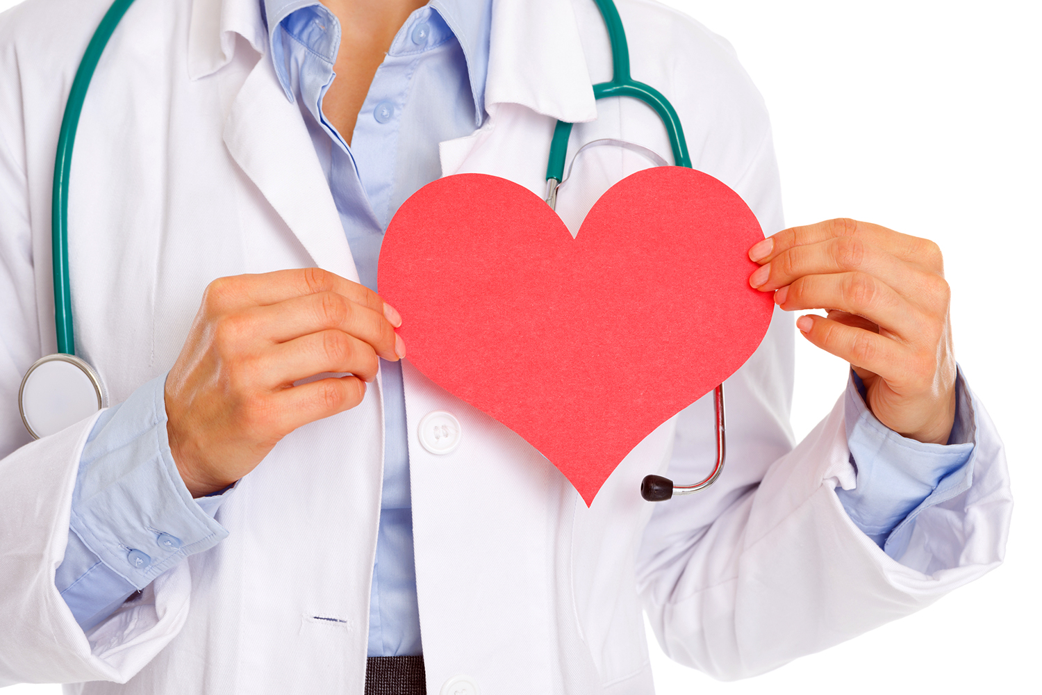 a doctor holding a paper cut-out of a heart