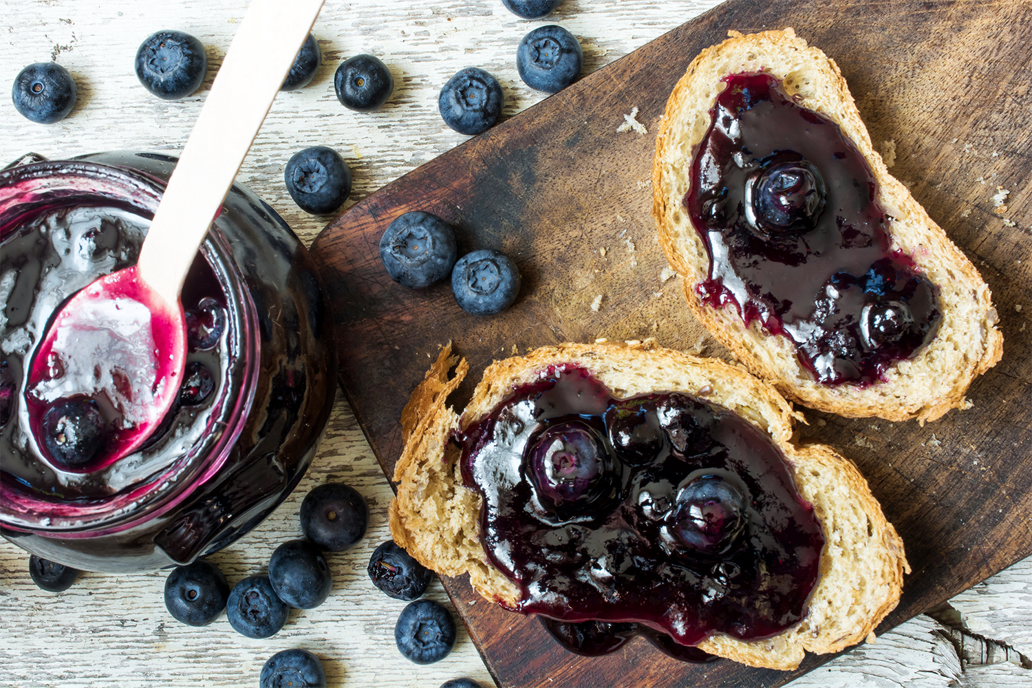 blueberry jam on fresh bread