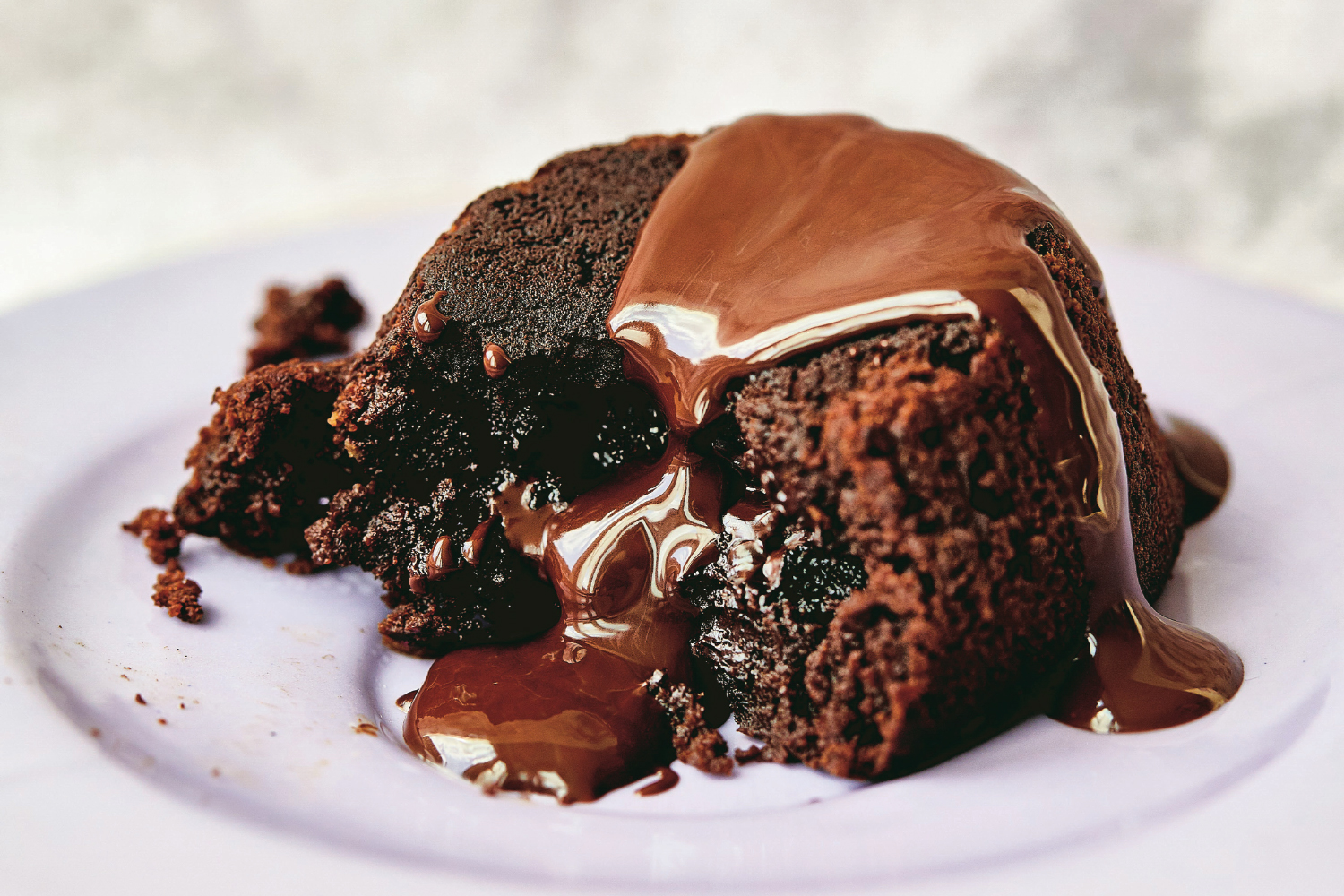 a cake oozing with chocolate