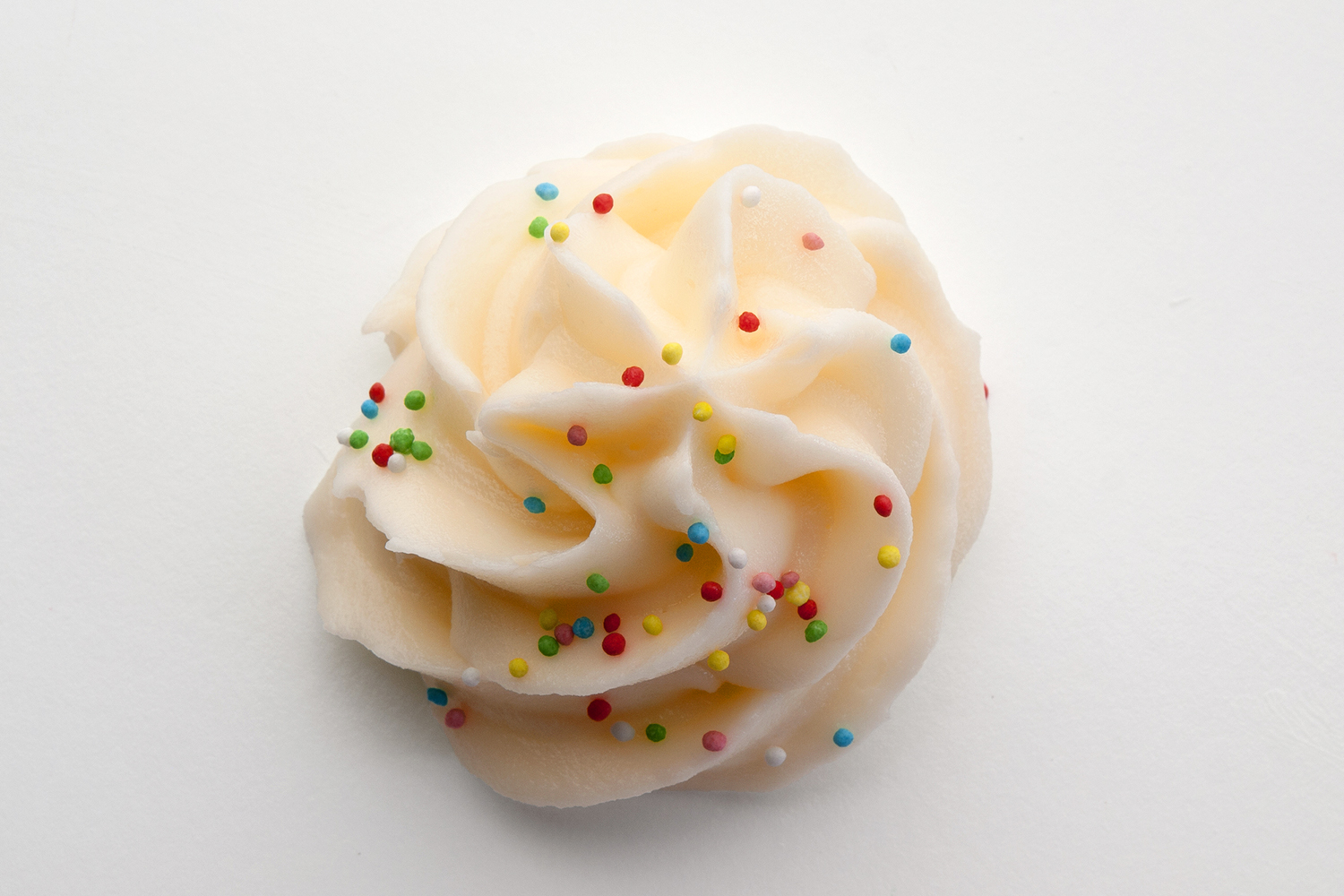 a swirl of caramel buttercream frosting
