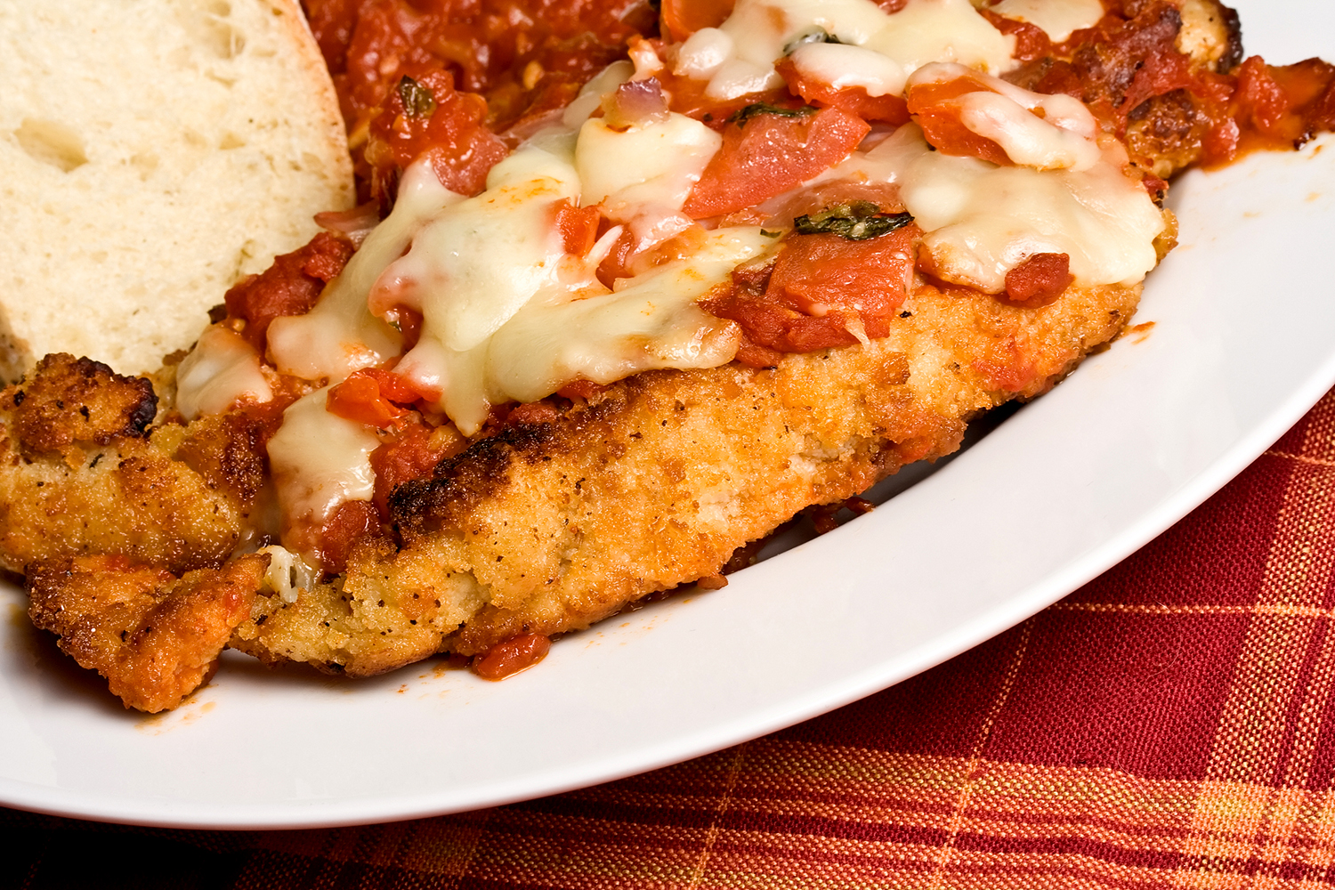 a plate of chicken parmigiano