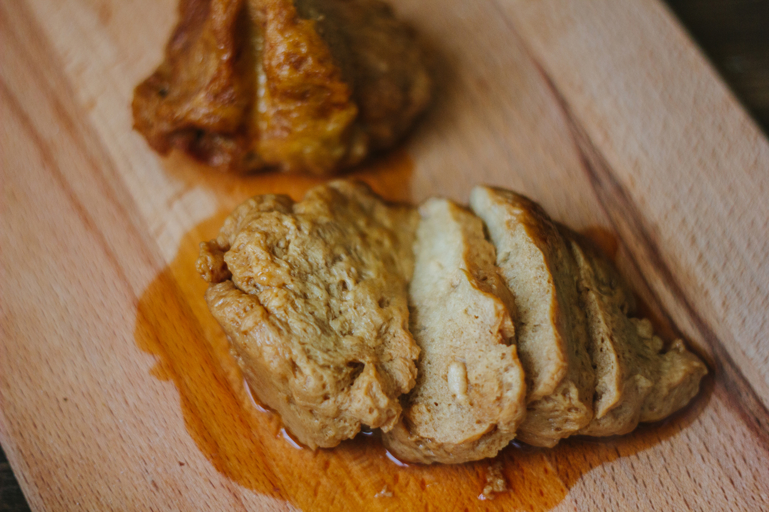 Sliced Seitan Roast on a cutting board.