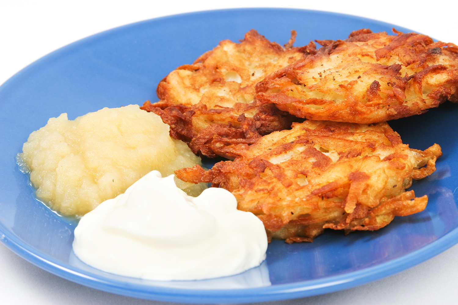 potato pancakes with applesauce and sour cream