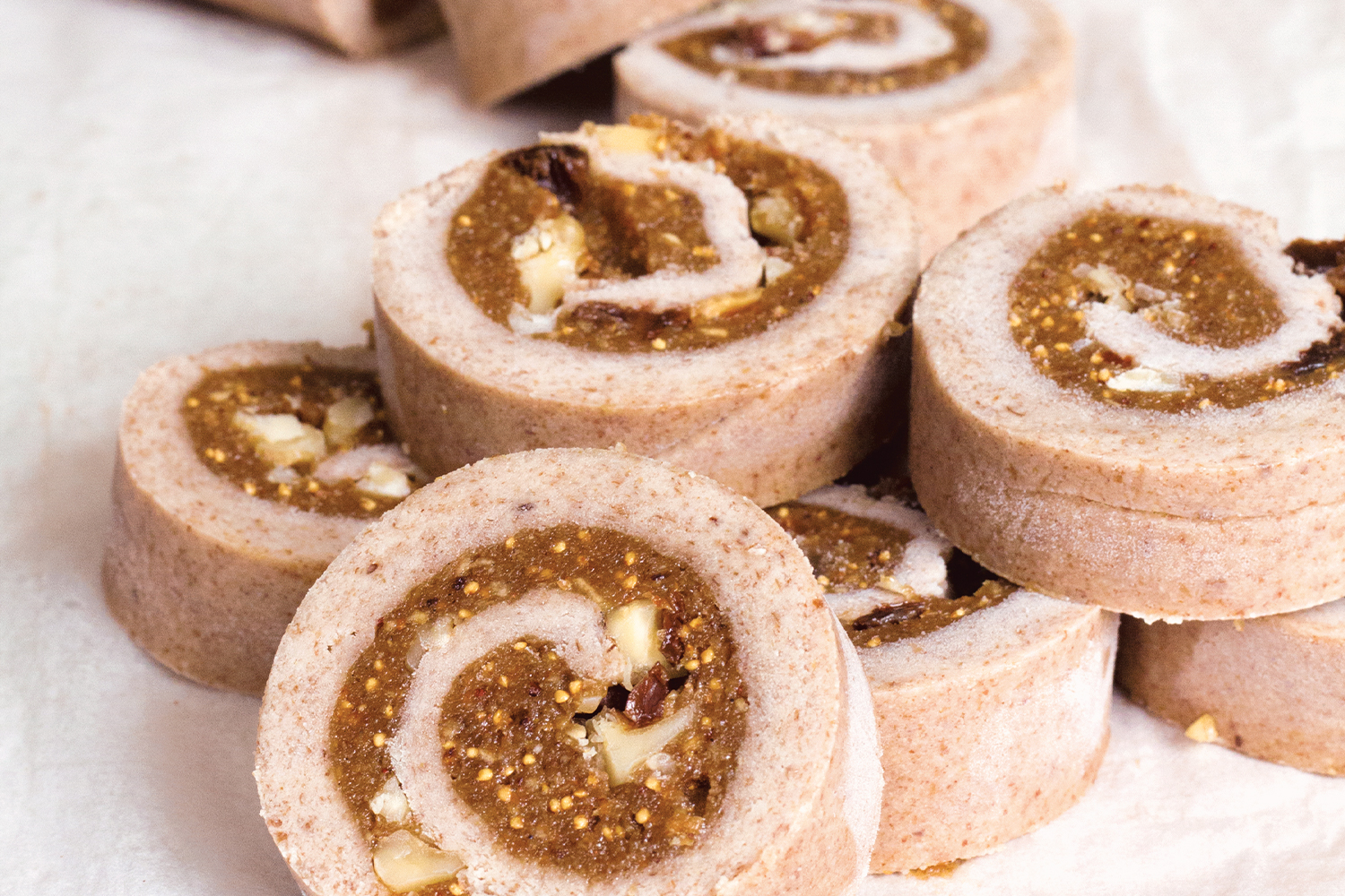 slices of raw cinnamon roll on a tea towel