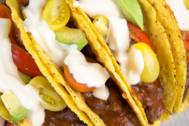 a plate of vegetarian tacos