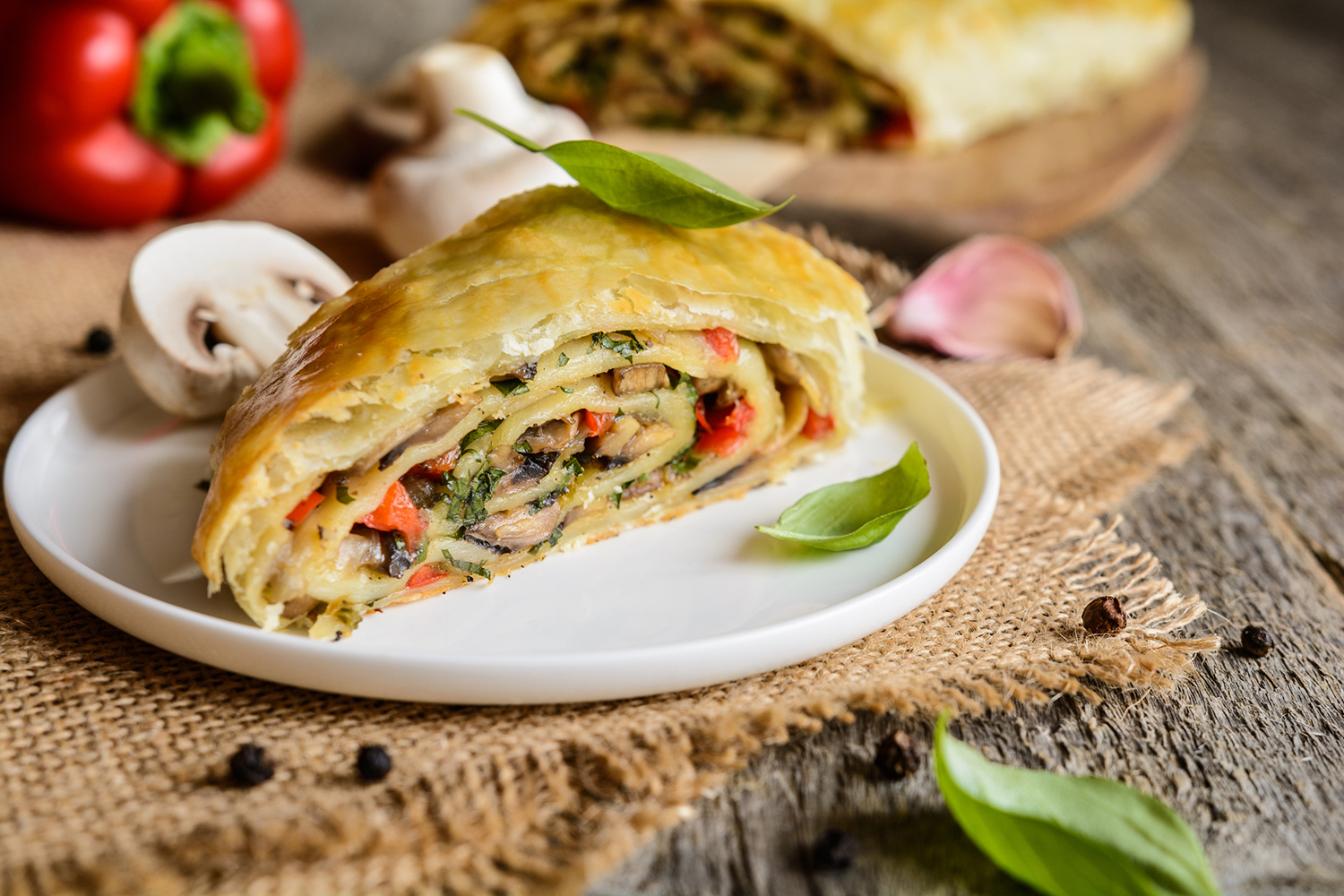 a strudel stuffed with vegetables and mushrooms