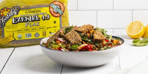 salad with croutons in white bowl