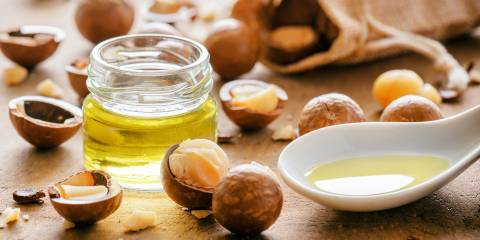 macadamia nuts and a spoonful of oil