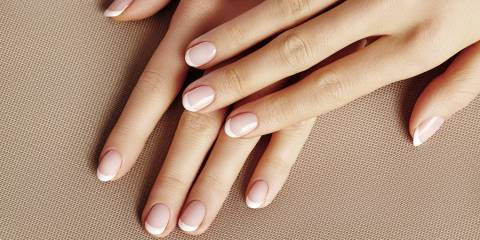 A woman's hands with well groomed healthy nails.
