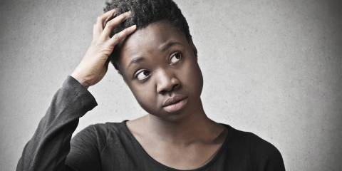 A distracted woman in deep confusion