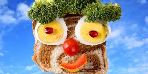 food arranged into a smiling face