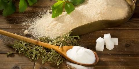 stevia leaves, cubes, and a scoop of sweetening powder