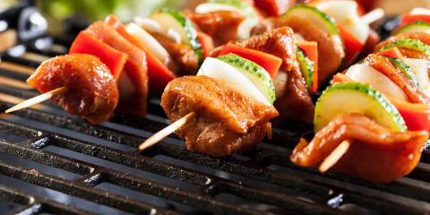 meat and cucumber shish kebabs on the grill