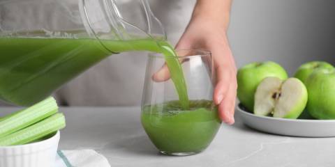 Celery juice being poured 