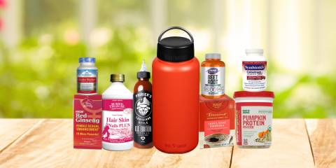 a variety of all-natural supplements, a canteen, and some BBQ sauce