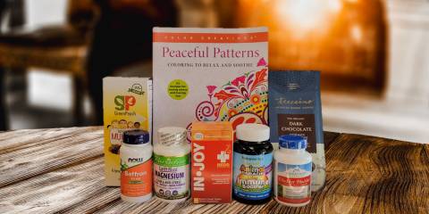 a selection of all-natural supplements and a coloring book