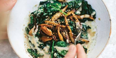 a bowl of charred kale topped with