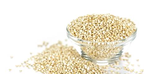 a bowl of quinoa ready to be cooked into porridge