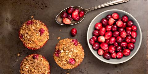 oat muffins with cranberries on a pan