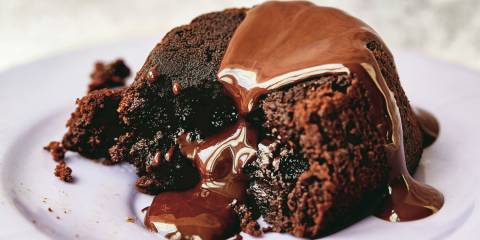 a cake oozing with chocolate
