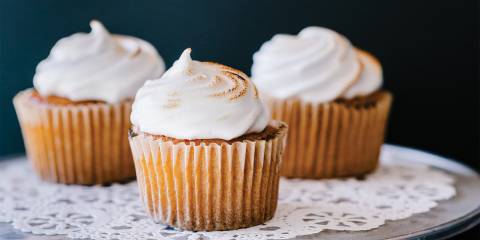 A plate of delicious lemon curd cupcakes with chickpea meringue