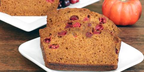 a slice of pumpkin bread with cranberries