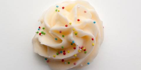 a swirl of caramel buttercream frosting