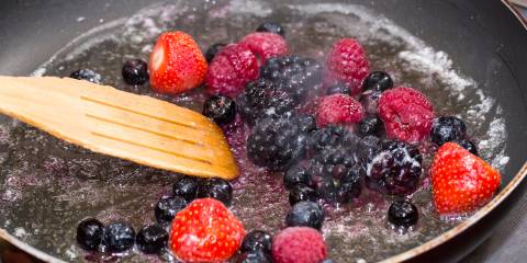 berries simmering in a pan to soften