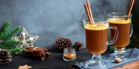 Hot buttered rum cocktail with cinnamon for winter holidays and colds.