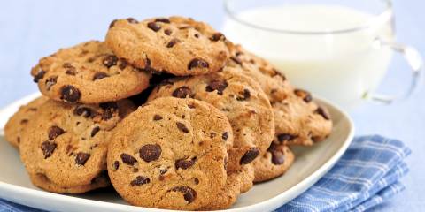 chocolate chip cookies and a cup of milk