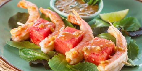 shrimp and cubes of watermelon plated nicely