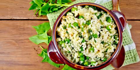 a bowl of couscous with peas
