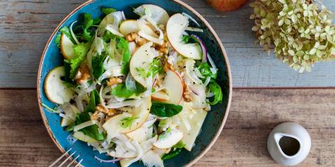 Apple and fennel salad with walnuts and greens. 