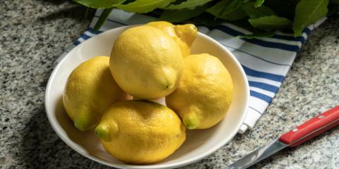 Bowl of lemons and bay leaves
