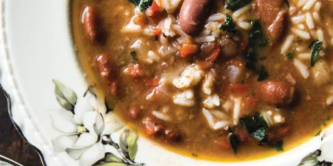 Red Beans and Rice Soup in a white bowl with floral accents.