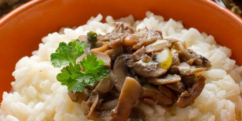 mushrooms on top of white rice