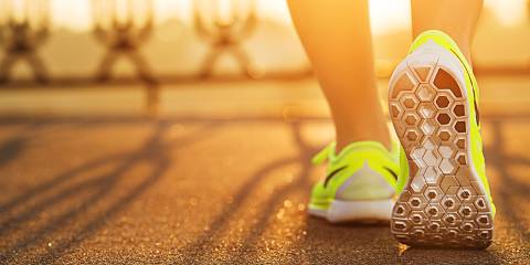 a close-up of a woman's running shoes