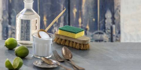 Eco friendly cleaning items with a rustic background.