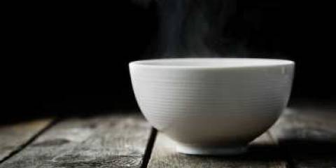 A bowl of steaming bone broth.
