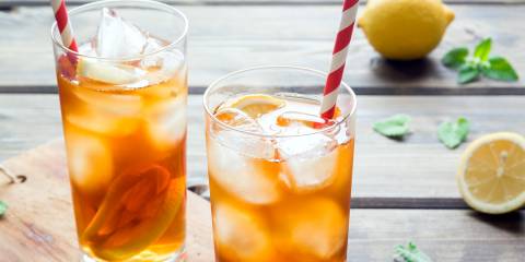 Two refreshing glasses of iced tea with lemon slices