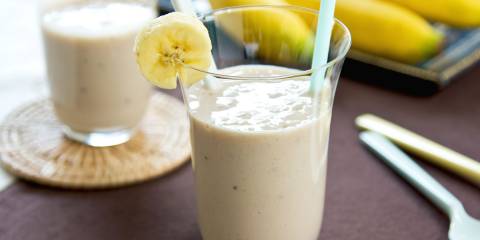 A cool, creamy smoothie garnished with banana
