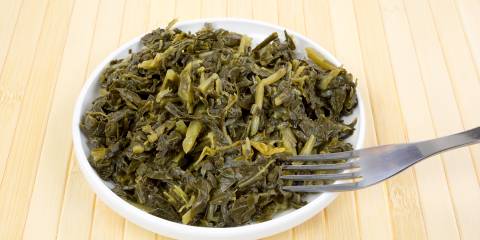 a bowl of collard greens straight from the pan