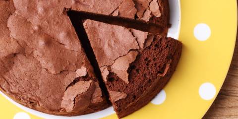 Slice of vegan chocolate chickpea cake on plate