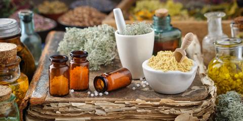 tools and bottles for homeopathic medicine