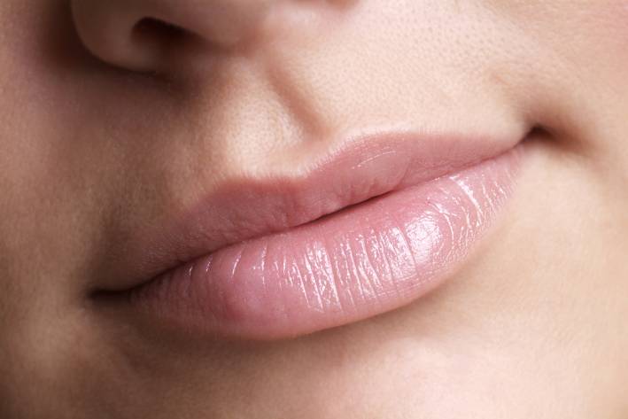 a close-up of natural and healthy lips