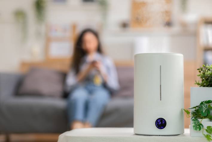 a woman inside with a diffuser